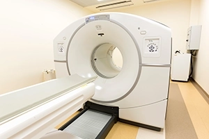 Empty MRI Scanner In Exam Room